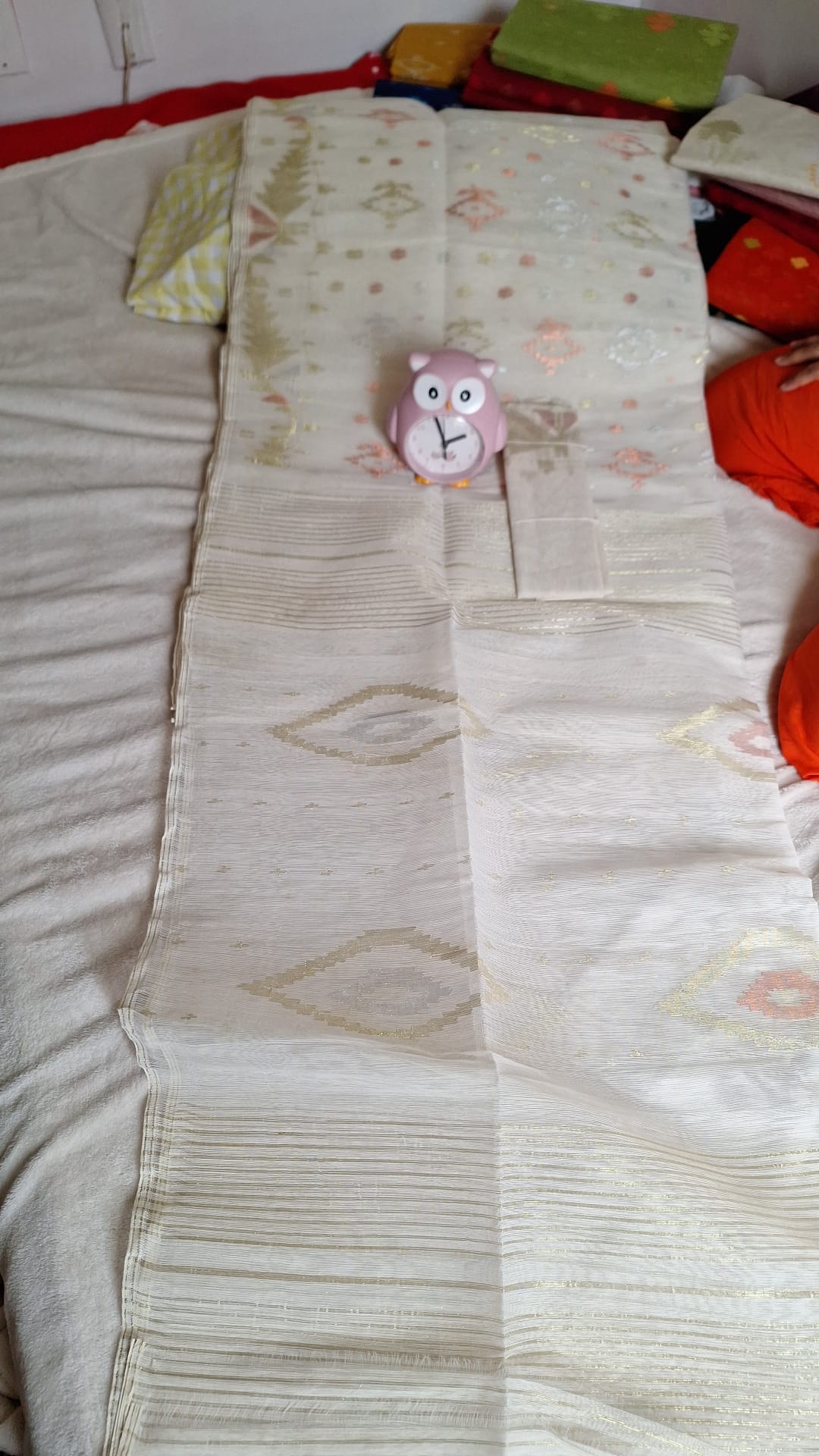 Subtle White Jamdani Saree with Golden and Pastel Accents